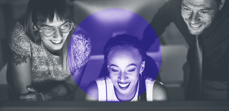 3 people looking at a computer screen